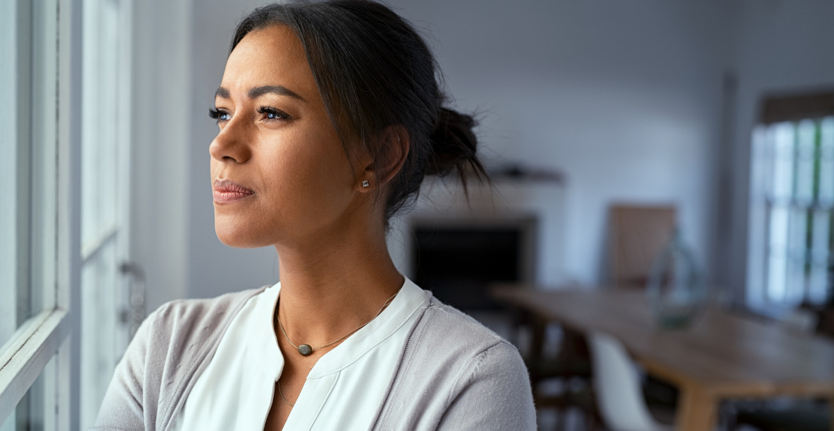 CAROUSEL Professional woman of colour thoughtful at home iStock 1319763211