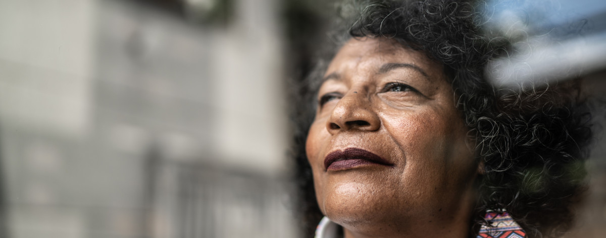 ETHNIC older woman deep in thought iStock 1304262745 v3