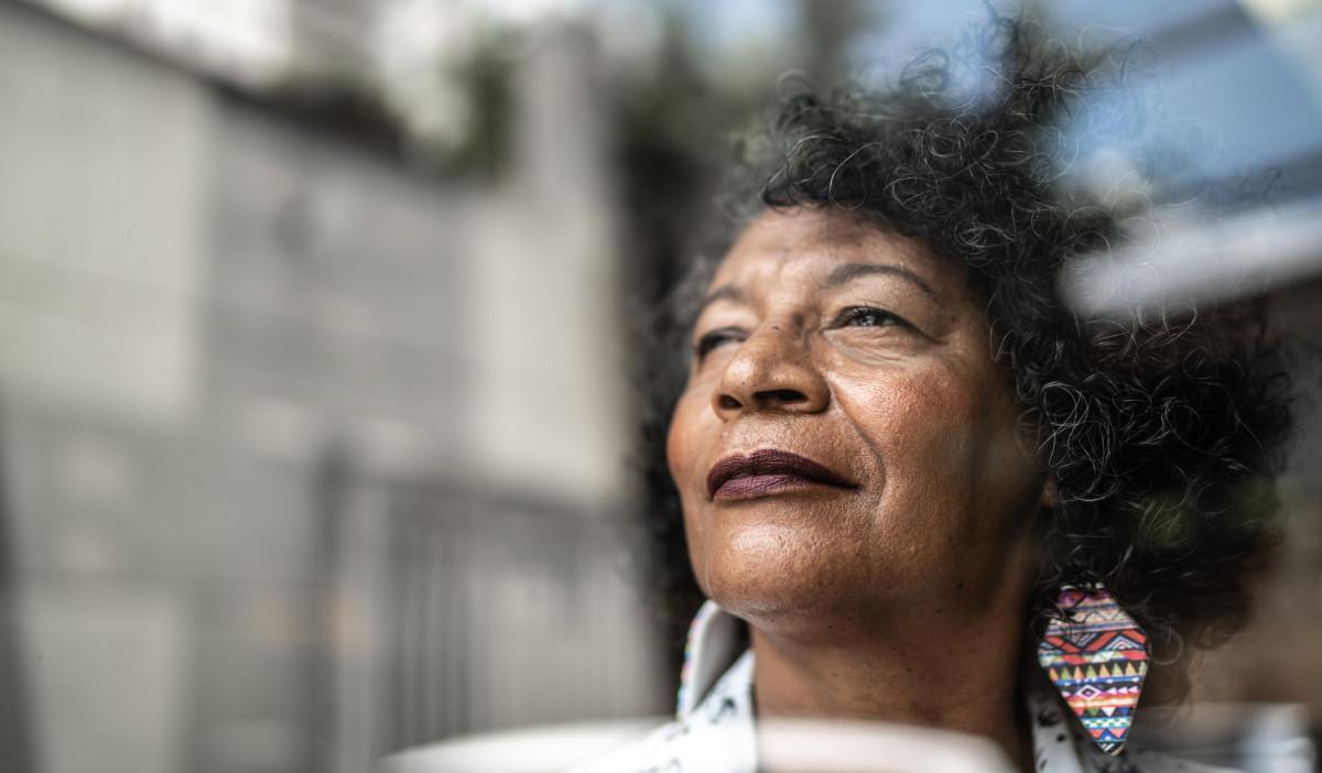 ETHNIC older woman deep in thought iStock 1304262745 v3