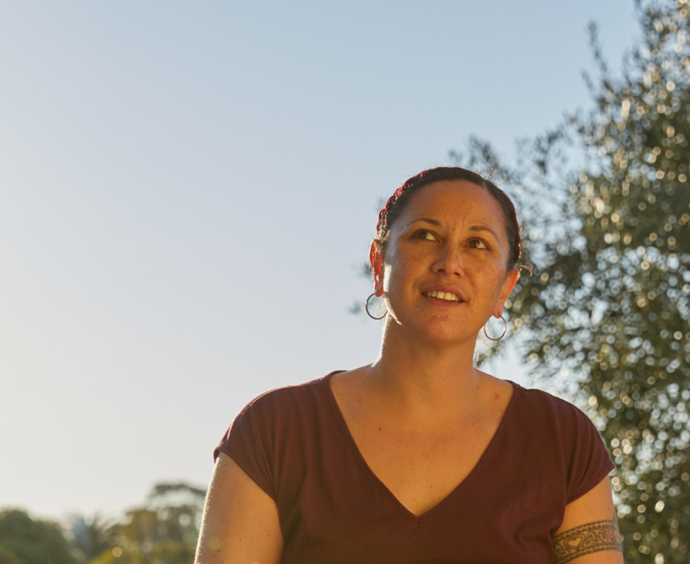 Confident woman standing outside, representing personal empowerment and seeking support for oneself