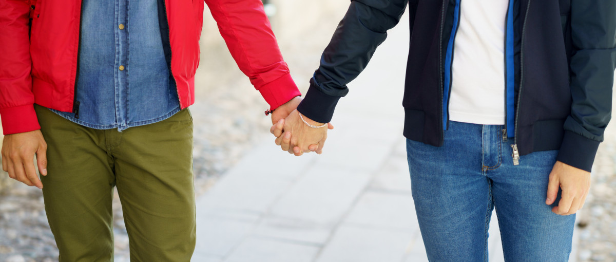 LGBTQIA Holding hands iStock 1396684825